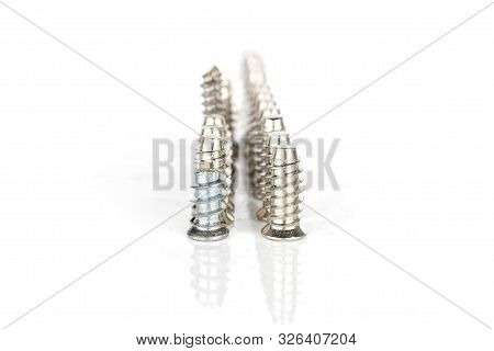 Lot Of Whole Metallic Glossy Bolt In Row Isolated On White Background