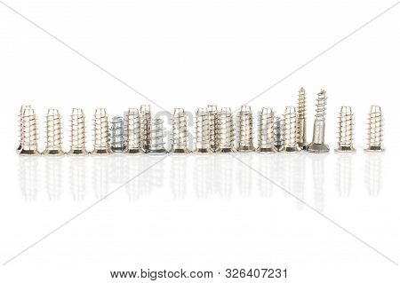 Lot Of Whole Metallic Glossy Bolt In Row Isolated On White Background