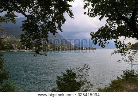 Cloudy Day At Lake Walchensee With Herzogstand Mountain Jochberg, Germany