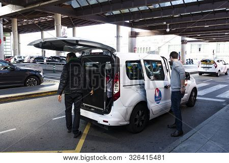 Madrid, Spain - 27 March, 2018: Taxi Of The White Color Of The City Of Madrid On City Streets.