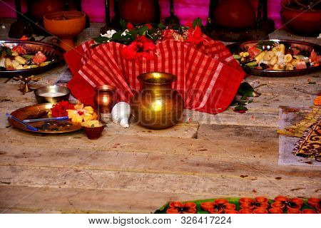 The Hindu Puja Materials Like Earthen Pots, Mango Leaves, Flowers, Earthen Lamps, Green Coconuts, Ga