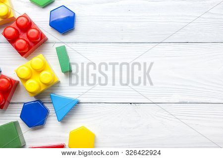 Kids Educational Developing Toys Frame On White Background. Top View. Flat Lay. Copy Space For Text