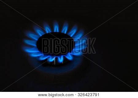 Gas-burner. Natural Gas In The House On A Black Background. Bhutan, Propane. Copy Space