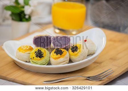 Thai Dessert `mochi ` In Thai Culture And Tea Water Or Fruit Juice