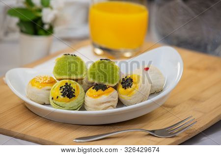 Thai Dessert `mochi ` In Thai Culture And Tea Water Or Fruit Juice
