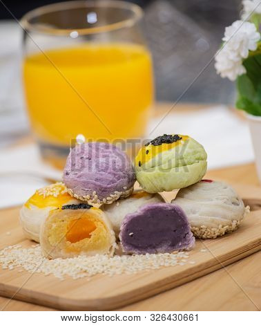 Thai Dessert `mochi ` In Thai Culture And Tea Water Or Fruit Juice