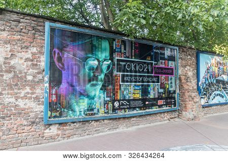 Krakow, Poland - July 27, 2019: Tokio 24 Krzysztof Gonciarz Billboard In The Center Of Krakow. Krzys