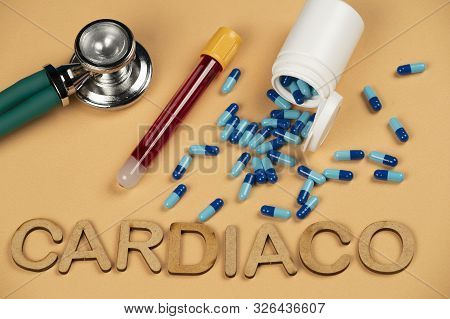 Blood Test Vacuum Tube With Blue Pill With The Word Cardiaco (cardiac).