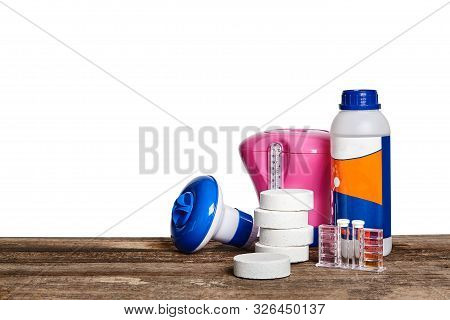 Equipment With Chemical Cleaning Products And Tools For The Maintenance Of The Swimming Pool On A Wo