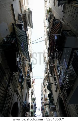 Decrepit Buildings On The Narrow Street In The European City