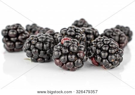 Dark Lot Of Whole Disordered Fresh Black Blackberry Isolated On White Background