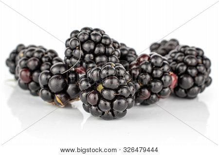 Lot Of Whole Fresh Black Blackberry Stack Isolated On White Background