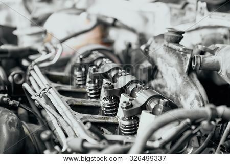 Close Up Of Four Nozzles In Car Diesel Engine, Newly Changed By Qualified Mechanic In Service Statio