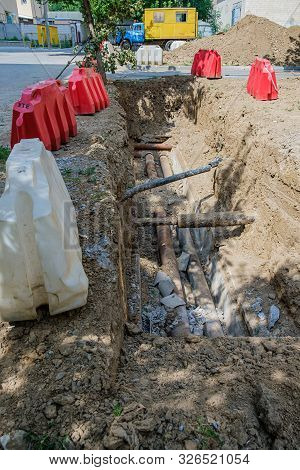 Protective Fencing Near The Pit When Replacing Pipes.