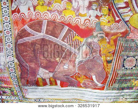 Dambulla, Sri Lanka - Aug 9, 2005: Religious Paintings Inside Of Rock Temple In Dambulla, Sri Lanka.