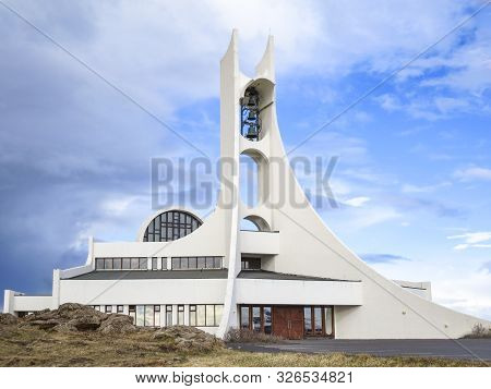 Iceland, Stykkisholmur - May 16, 2015: Architecture Designed Modern White Church On Top Of A Hill In