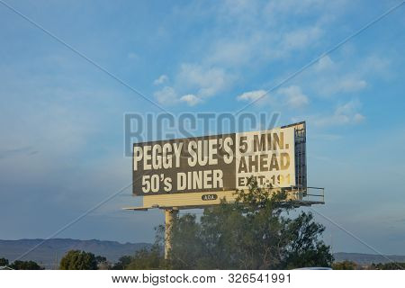 Yermo, Usa - Mar 11, 2019: Advertising For Peggs Sues Diner In 5 Miles, Exit 191.