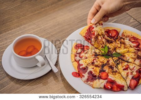 Woman Eating Delicious Strawberry Pizza On A Balinese Tropical Nature Background. Bali Island, Indon