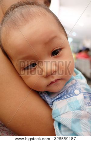 Asian Boy With Strabismus,portrait Of Infant In Concept Of Health And Medical.