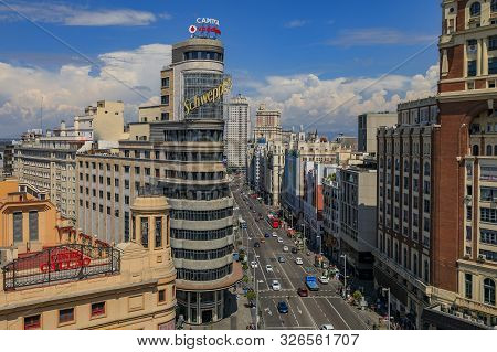 Madrid, Spain - June 4, 2017: Aerial View Of The Iconic Edificio Carrion Or Capitol Building With Sc