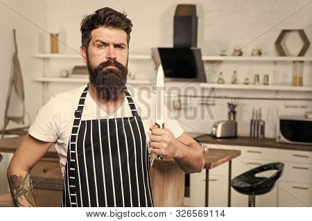 Kitchen Equipment. Culinary Business. Tasty Cuisine. Serious And Confident Chef In Restaurant. Beard