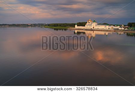 Holy Trinity Ipatiev Monastery At Dawn, View From The Bridge Over The Kostroma River On A Summer Mor