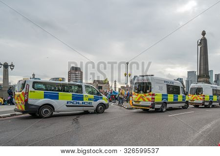 London, Uk - October 7, 2019: Police Cars Near Lambert Bridge During The Extinction Rebellion Protes