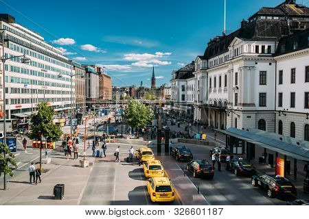 Stockholm, Sweden - June 28, 2019: Yellow Taxi Cars Parked On Street Near Stockholm Central Station.