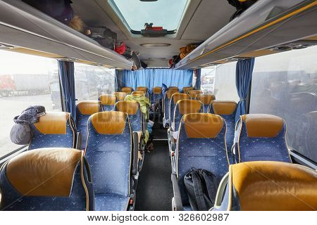 Bus interior empty seats, stop on a long distance trip