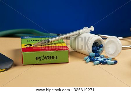Fake Medicine Box With The Name Of The Disease Coracao And A Glucometer
