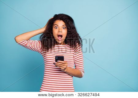 Photo Of Crazy Speechless Shocked Fascinated Youngster Holding Telephone With Mouth Oped Wide Stunne