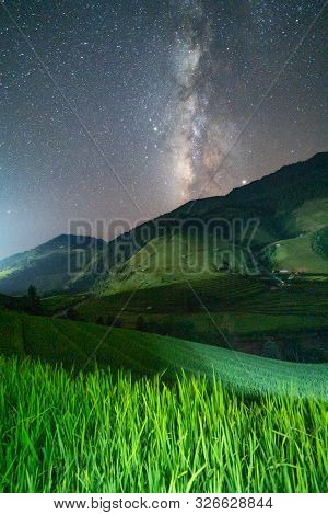 Paddy Rice Terraces With Stars And Milky Way, Green Agricultural Fields In Countryside Or Rural Area