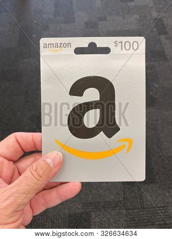 Orlando,fl/usa-10/7/19: An Amazon Gift Card Ready For A Person To Purchase As The Perfect Gift For A