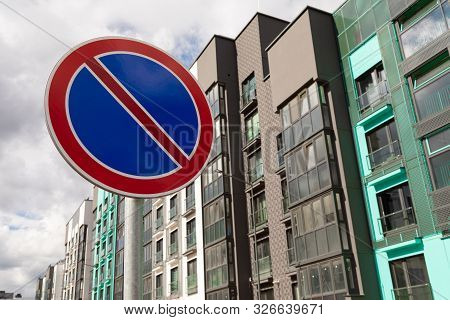 Close-up Of European Roadsign Parking Prohibited In Dormitory District