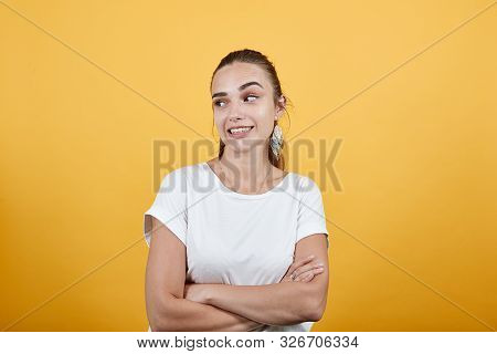 Girl Thinking Figuring Out In Some Question Sign Of Thoughts Also She Is Keeping Eyebrows In Opposit