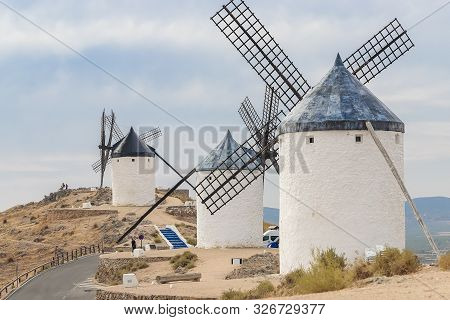 Horizontal View Of Old Windmills On Calderico Hill Of The Spanish Municipality Of Consuegra. These W