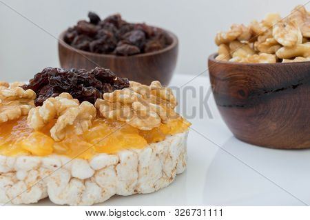 Rice Biscuit With Cream And Sweet Papaya, Nuts And Raisins.