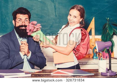 Small School Girl Kid With Flower Bouquet. Back To School. Happy Teachers Day. Knowledge Day Is 1 Se