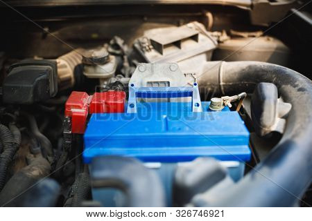 new lead-acid automotive electric battery replacement in old car