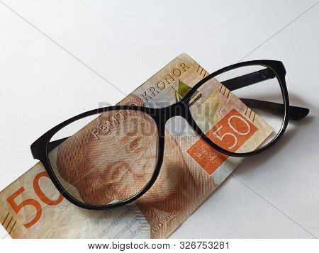 Investment And Promotion For A Better Vision, Swedish Banknote Of Fifty Kronor And Black Plastic Fra