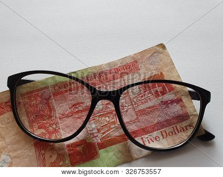 Investment And Promotion For A Better Vision, Belizean Banknote Of Five Dollars And Black Plastic Fr