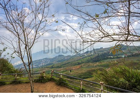 Sunset Of Panoramic View Mountain Range With Village On Nature Trail In Phu Thap Buek National Park 