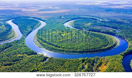 Aerial Photography Of Landscape In Western Siberia. Agan River, Tributary Of Ob River.