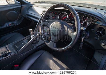 Novosibirsk, Russia - 10.09.2019: Interior Of A Rare Japanese Sports Car In The Back Of A Gray Toyot