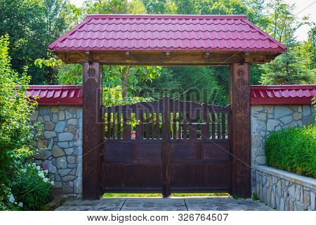 Wood Gates An The Entrance To Crasna Monastery In Prahova, Romania