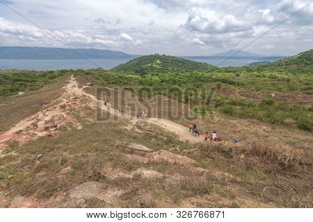 Tourists Walking Hiking Trekking Tour Trail To Taal Volcano, Batangas, Philippines