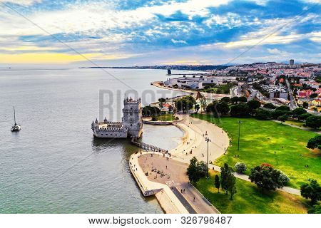 Aerial View Of Belem Tower In Lisbon, Portugal During The Hot Evening In Summer