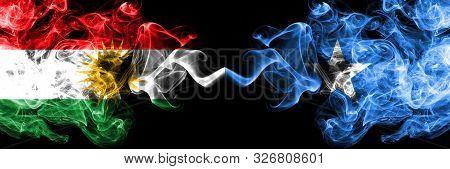 Kurdistan Vs Somalia, Somalian Smoke Flags Placed Side By Side. Thick Colored Silky Smoke Flags Of K