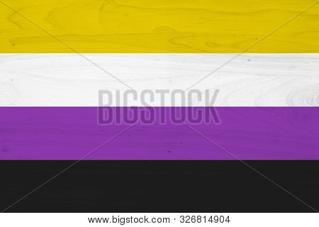 A Non-binary Flag On With Wood Texture For A Background 3d Illustration