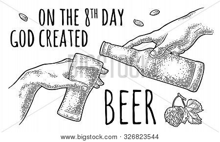 Male Finger Pouring Beer From Bottle Into Glass. The Creation Of Adam.